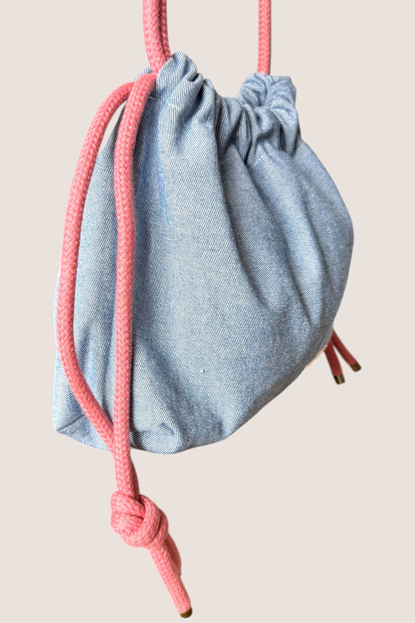 mini sac bourse jean clair cordon rose Maison PoumPoum matière denim
